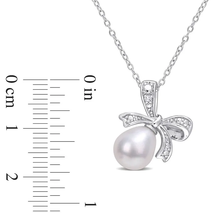 Goldia 8590mm Oval Cultured Freshwater Pearl and Natural Diamond Accent Bow Pendant in Sterling Silver Necklaces